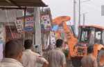 nuh violence: action bulldozer on near skm medical college illegal construction