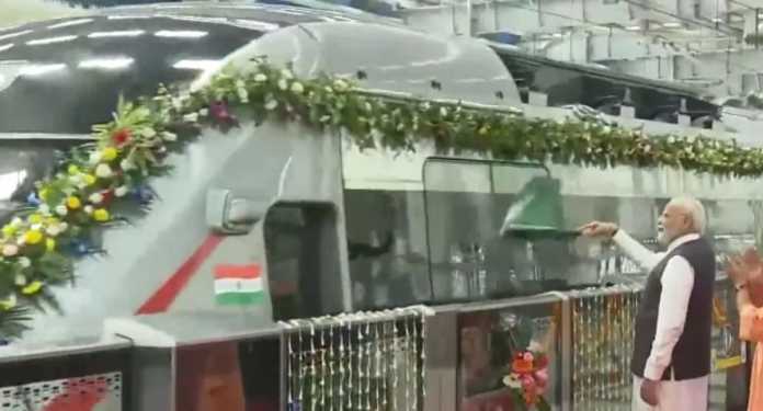 pm narendra modi flag of rapidx train