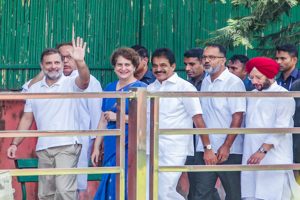 BJP-leaders-outraged-over-the-ritual-bathing-of-Rahul-Gandhis-photograph-with-milk